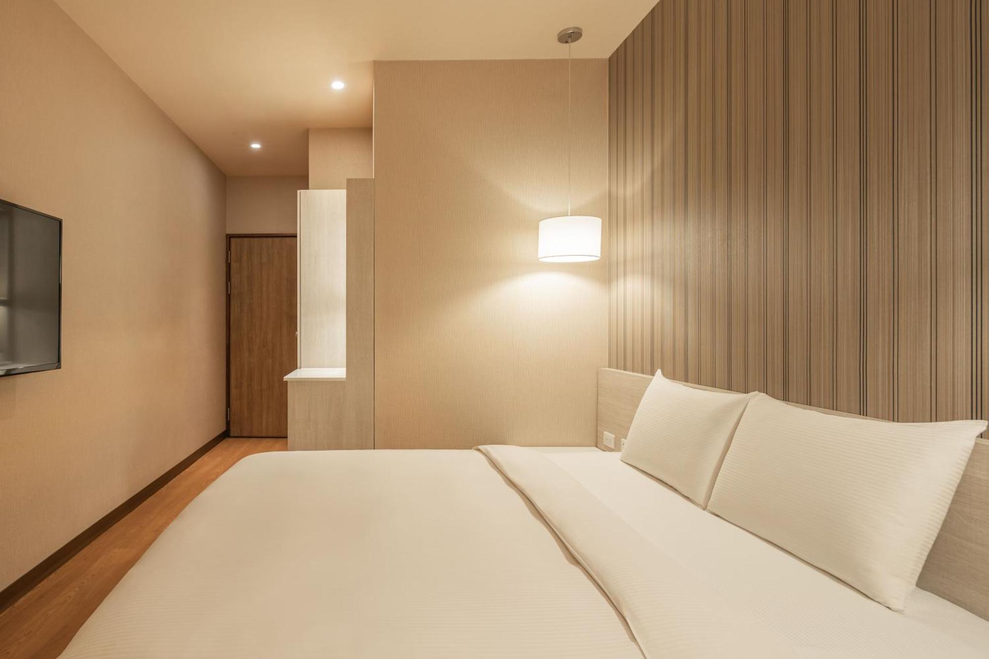 Kindness Hotel-Jue Ming Kaohsiung Chambre photo