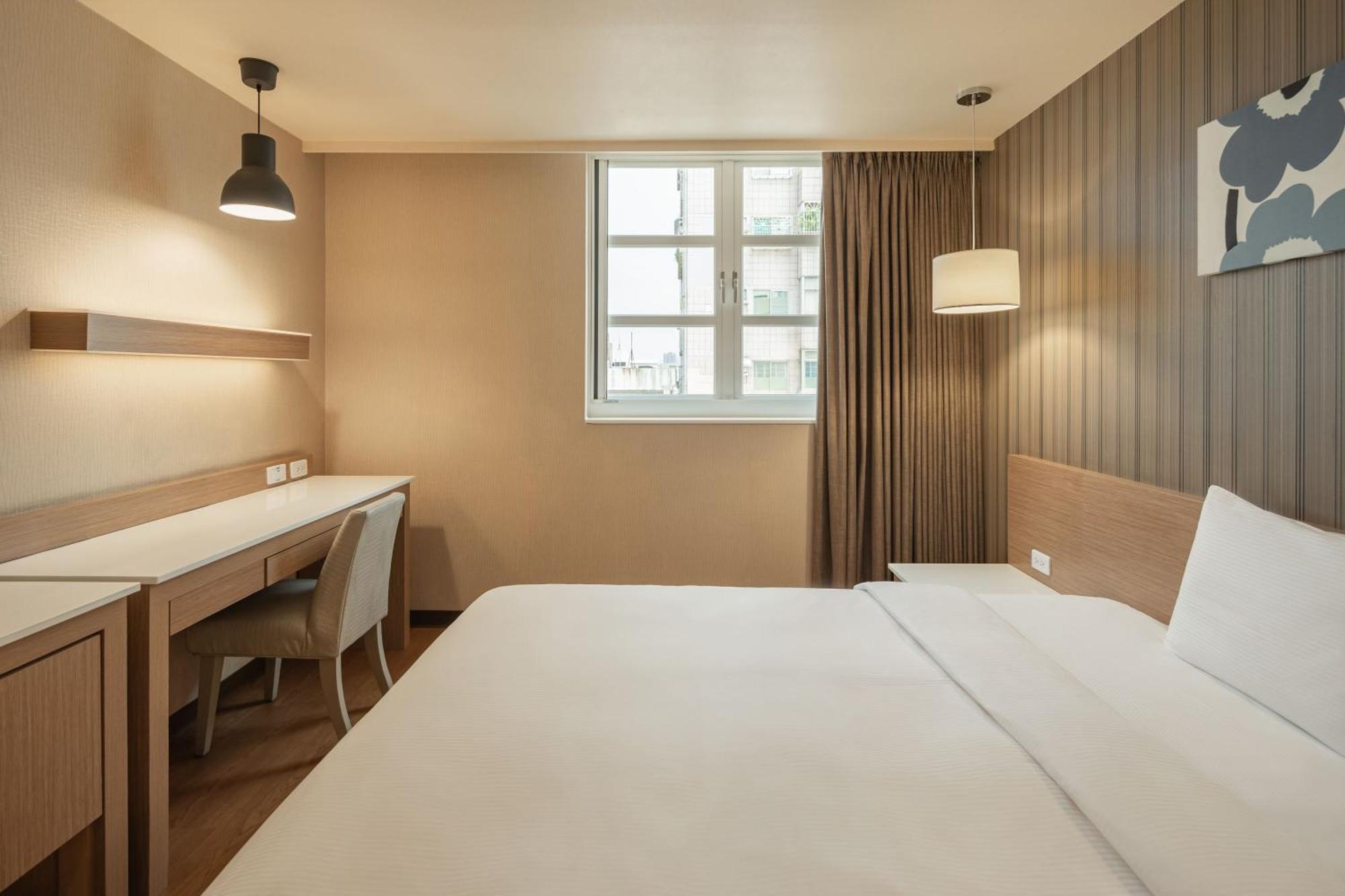 Kindness Hotel-Jue Ming Kaohsiung Chambre photo